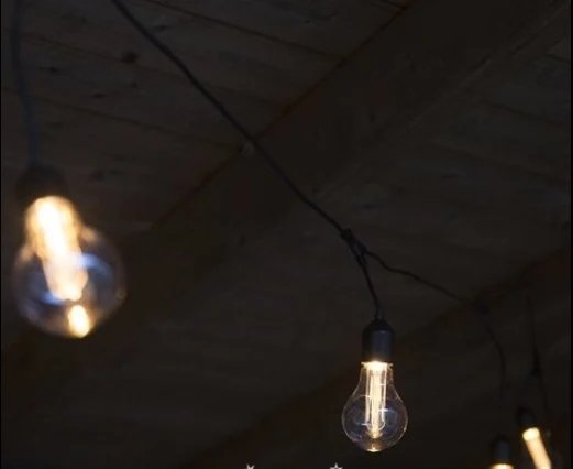 Светодиодная бахрома Гирлянда из лампочек 9.5 м, 20 ламп с экстра теплым белым светом, черный пвх, соединяемая, IP44 Kaemingk 490105